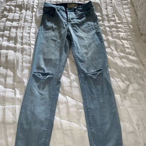 Ripped at the knee jeans